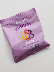 Purple package of Funday gummy snakes on a light gray background