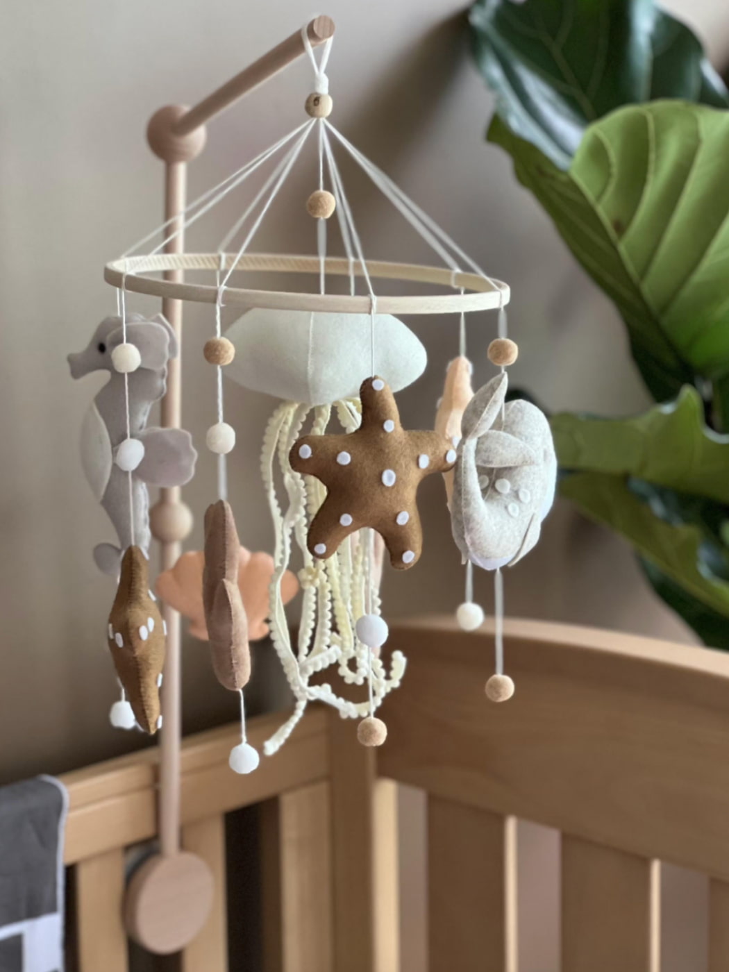baby mobile with a seahorse, jellyfish, sea star and more